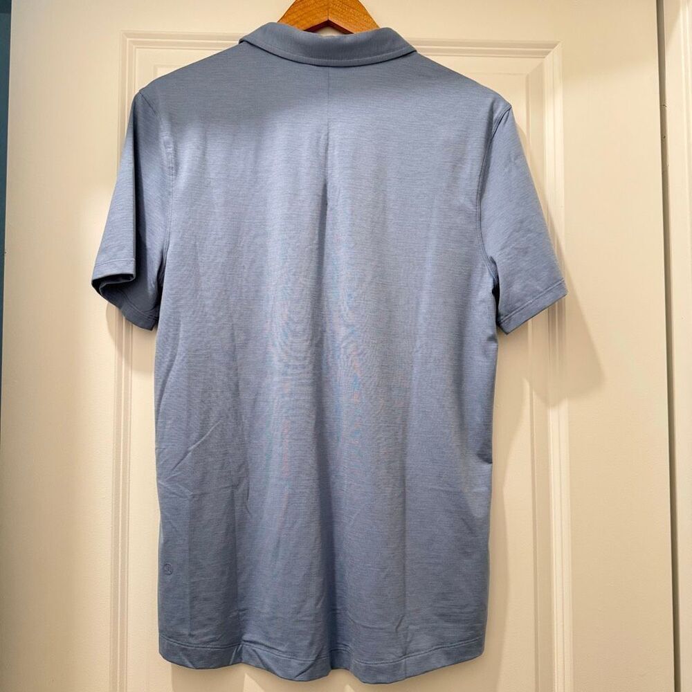 Lululemon Evolution Short Sleeve Polo Shirt in a blue color size Small